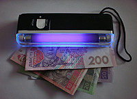 Портативный детектор валют